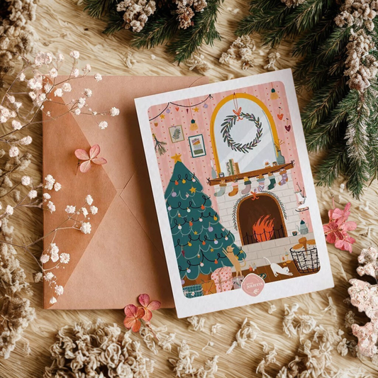 Carte postale Noël chaleureux et son enveloppe